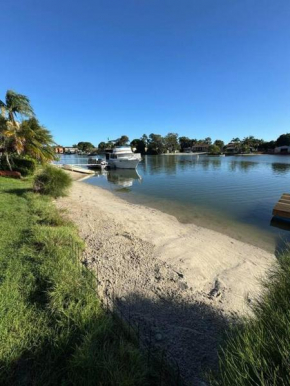 House and Van on the River Tweed Heads